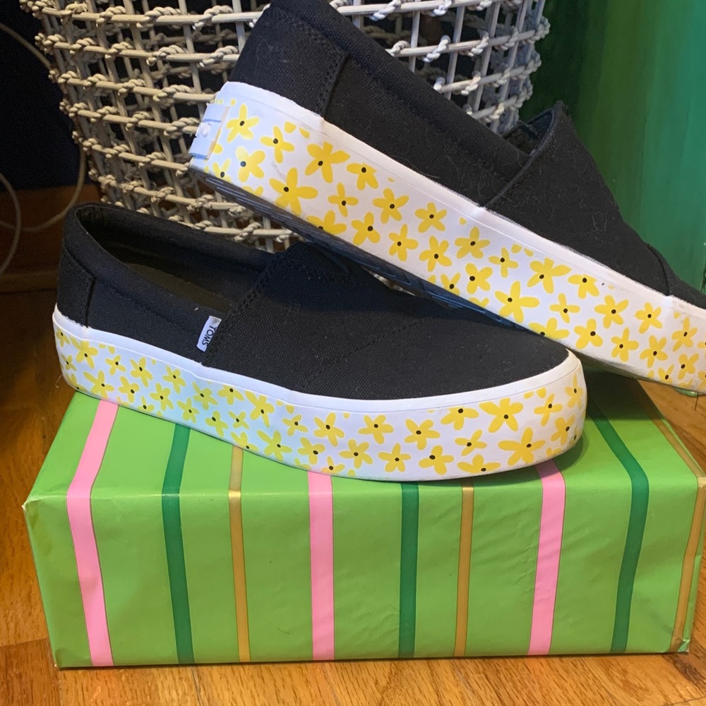 Toms Black Slip-On Sneakers with Yellow Floral Pattern
